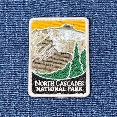 Patch of North Cascades National Park on a denim background