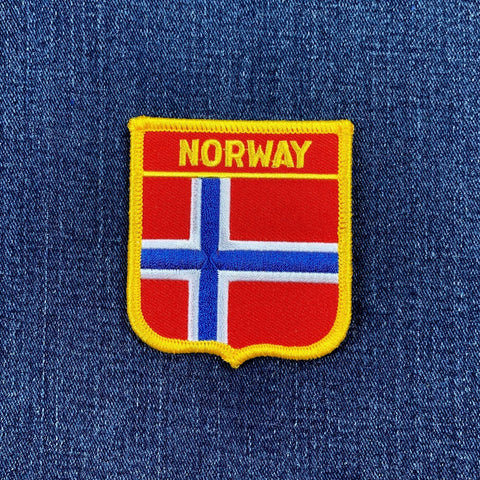 Norway flag patch on a blue denim background