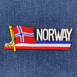 Embroidered patch of the Norwegian flag on a denim background