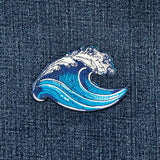 Blue wave patch on a denim background