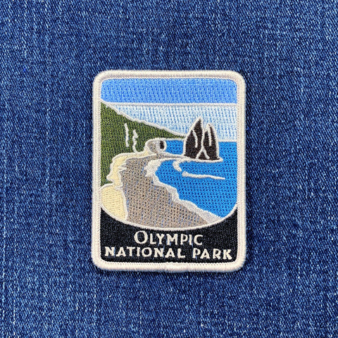 Olympic National Park patch on a blue denim background
