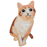 Embroidered patch of a cat on a white background