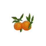 A patch depicting two oranges with green leaves on a white background