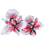 A pink and white orchid applique patch, intended for iron-on application.