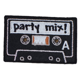A patch depicting a cassette tape with the text 'party mix!' on it, designed to be ironed onto fabric.
