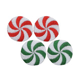 Four round peppermint candy patches on a white background