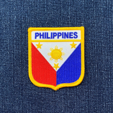 Philippines flag patch on a blue denim background