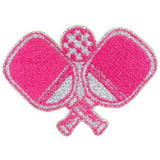 A pink and silver embroidered patch featuring two crossed pickleball paddles with a tennis ball motif at the top, shown on a plain white background.