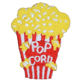 Embroidered patch of a popcorn bucket with yellow popcorn and red stripes on a white background