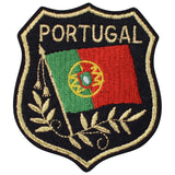 A shield-shaped patch with the text 'PORTUGAL' at the top. The patch features an emblem and the colors of the Portuguese flag, with decorative elements in gold.