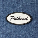 Patch with 'Pothead' text on a denim background