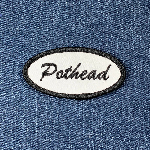 Patch with 'Pothead' text on a denim background