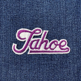 Embroidered 'Tahoe' patch on a denim background