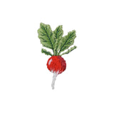 Embroidered radish patch with green leaves on a white background