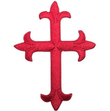 A red embroidered cross applique patch