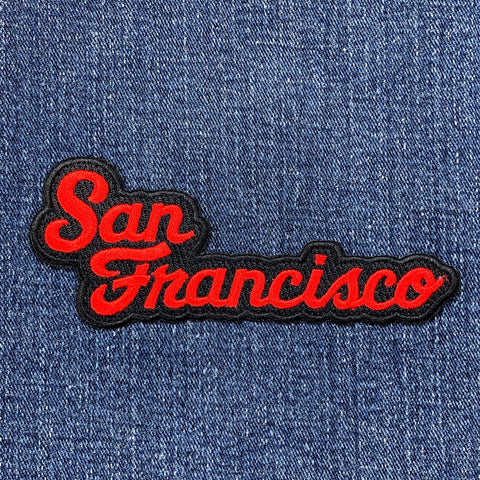 Embroidered patch with 'San Francisco' text on denim fabric