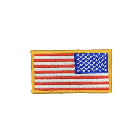 An embroidered United States flag patch with a yellow border, featuring red and white stripes and a blue canton with white stars, shown on a plain white background.