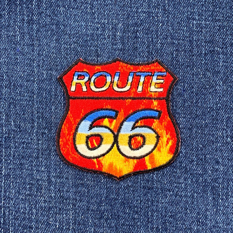 Route 66 patch in a flaming theme on a denim background