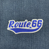 Embroidered 'Route 66' patch on denim fabric