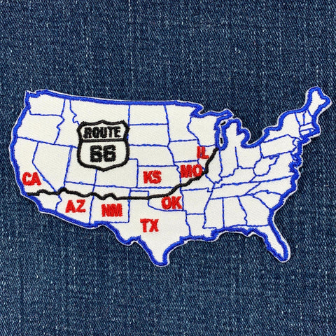 Map of the United States with Route 66 highlighted on a denim background
