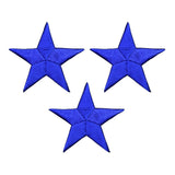 three royal blue embroidered star patches on a white background