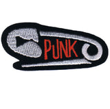 a punk safety pin patch on a white background