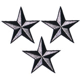 Three silver and black star-shaped patches on a white background