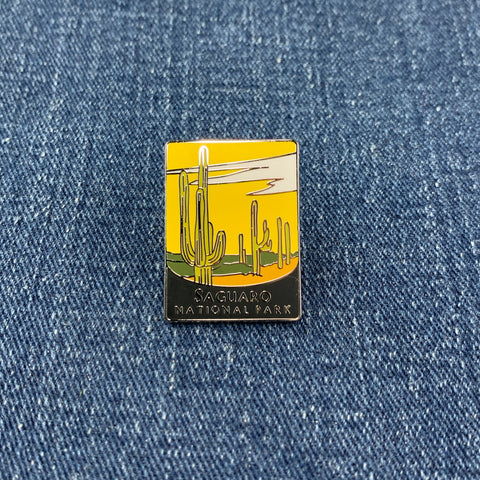 Pin with Saguaro National Park design on a denim background