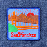 A patch featuring the Golden Gate Bridge with a California sunset and the text 'San Francisco' iron on.