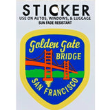 A Golden Gate Bridge sticker package on a white background. The sticker features a yellow border, a blue center, and an orange-red bridge with yellow text reading 'Golden Gate Bridge' and 'San Francisco'.