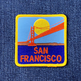 Embroidered patch of the Golden Gate Bridge with 'San Francisco' text on a denim background