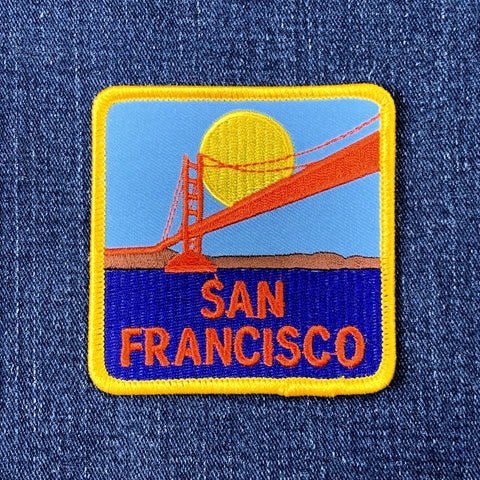 Embroidered patch of the Golden Gate Bridge with 'San Francisco' text on a denim background
