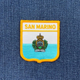 San Marino patch on a blue fabric background