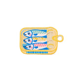 Embroidered patch of three fish in a can on a white background