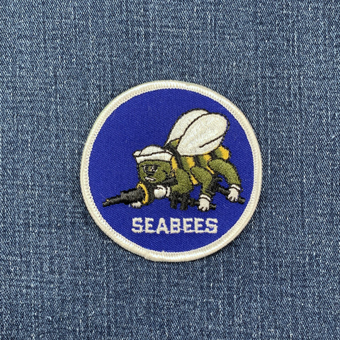 Seabees patch on a denim background