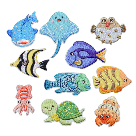 Collection of colorful sea creature patches on a white background