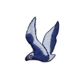 Blue and white bird-shaped patch on a white background