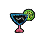 Patch of a cocktail glass with a lime garnish on a white background