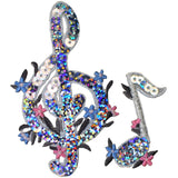 A set of two colorful sequin patches designed as musical notes with floral patterns, intended to be ironed onto fabric.