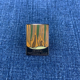 A rectangular enamel pin for Sequoia National Park showing towering orange-brown sequoia trees against a denim background.