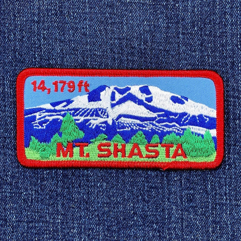 Patch of Mount Shasta with height 14,179 ft on a denim background