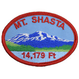 A shield-shaped patch with a blue background featuring a mountain range and the text 'Mt. Shasta, California 14,179 Ft.