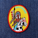 Patch with a Native American chief and horse on a denim background