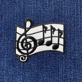 Music notes and treble clef patch on denim fabric