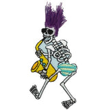 Embroidered patch depicting a walking skeleton wearing sunglasses, a spiked purple hairdo made of loose thread, and blue and yellow striped shorts. The skeleton is playing a yellow saxophone.