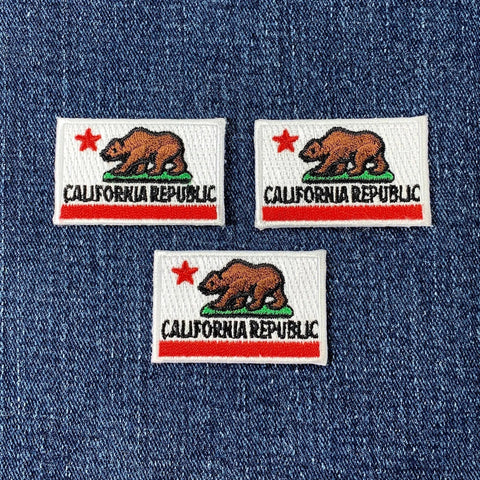 Three California Republic patches on a denim background