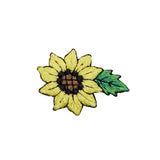 Embroidered patch of a sunflower with a green leaf on a white background