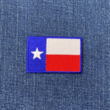Texas flag patch on a denim background