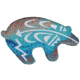 A embroidered Southwest bear applique patch in blue and green colors.