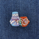 southwest pottery embroidered patch on a denim background